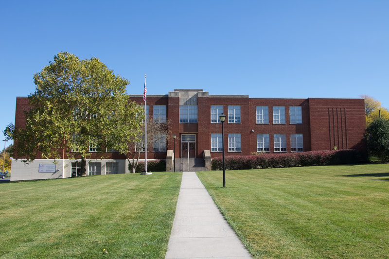 Lucy F. Simms School - ROOTS RUN DEEP